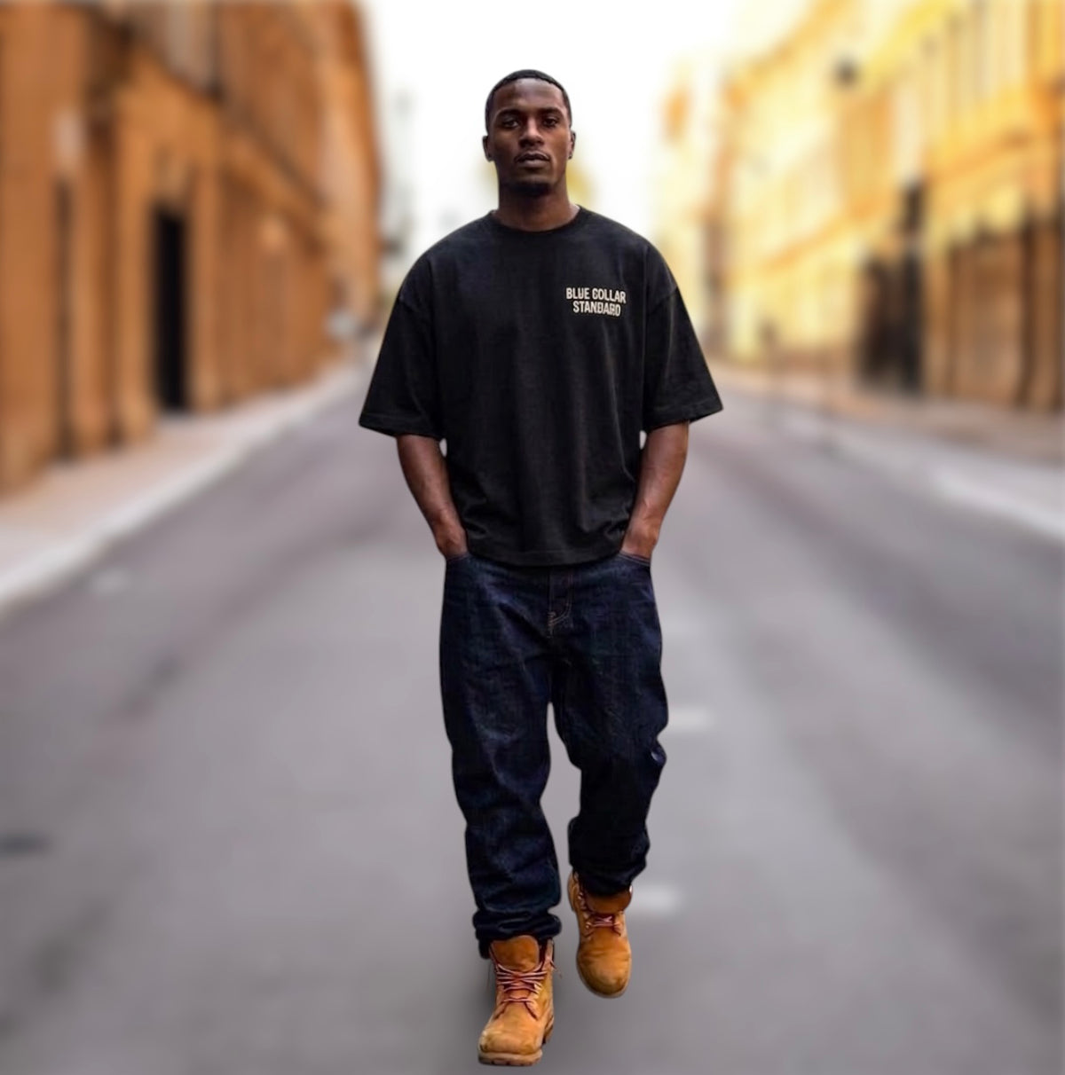 Foundation Tee in Asphalt black — back view showing the dropped-shoulder fit by Blue Collar Standard