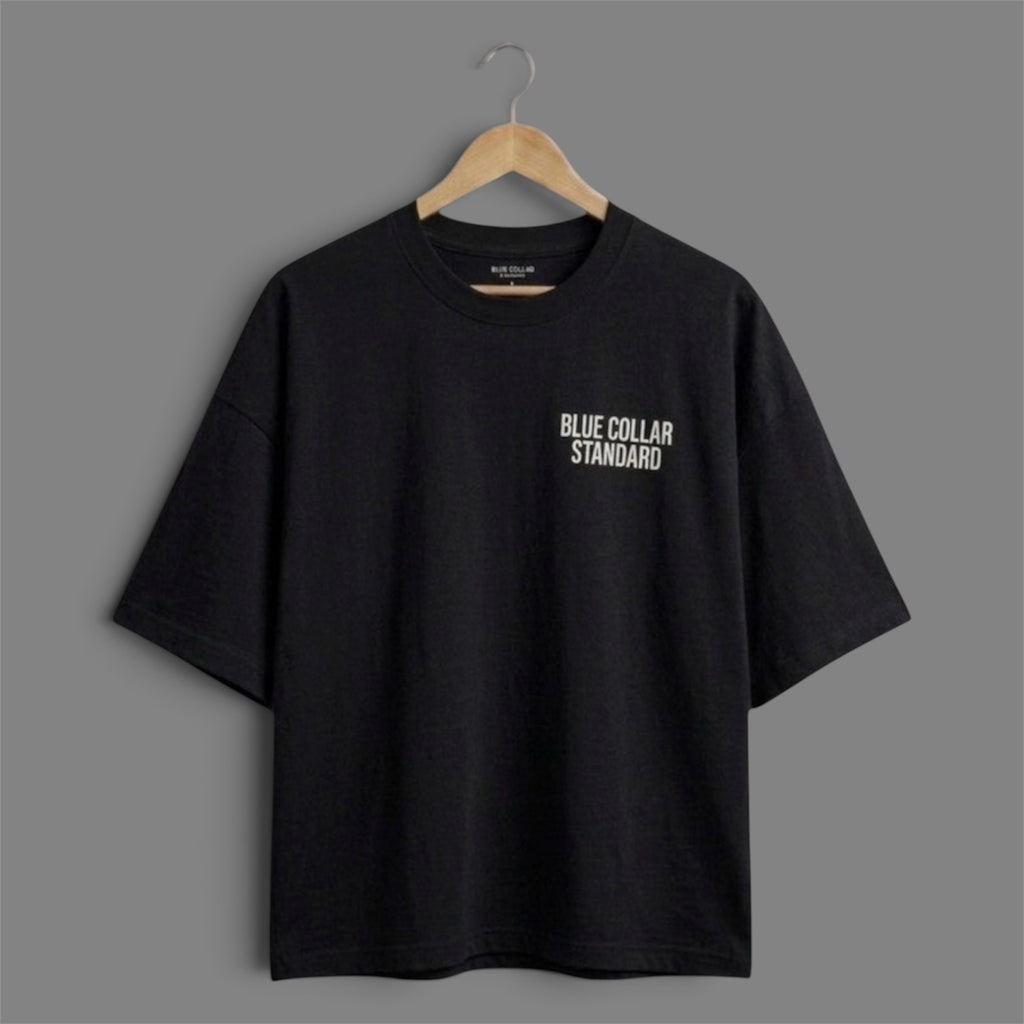 Foundation Tee in Asphalt black — front view of the boxy, dropped-shoulder silhouette by Blue Collar Standard
