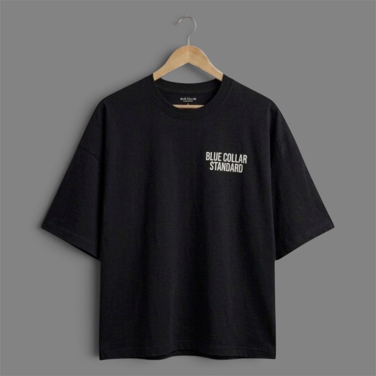 Foundation Tee in Asphalt black — front view of the boxy, dropped-shoulder silhouette by Blue Collar Standard