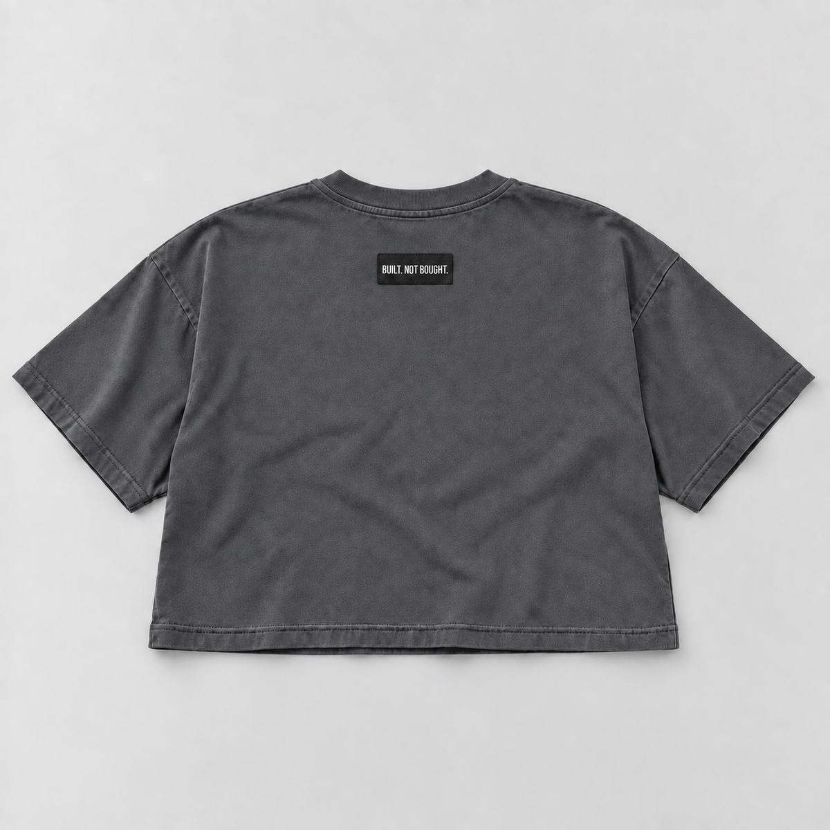 Charcoal Standard Heavyweight Crop Tee, back view with Built. Not Bought. woven shoulder label