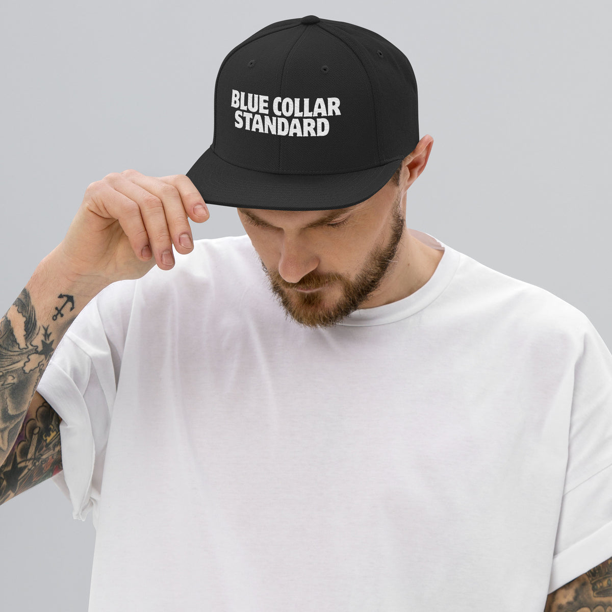 BCS structured flat bill snapback hat in black with green undervisor, front view